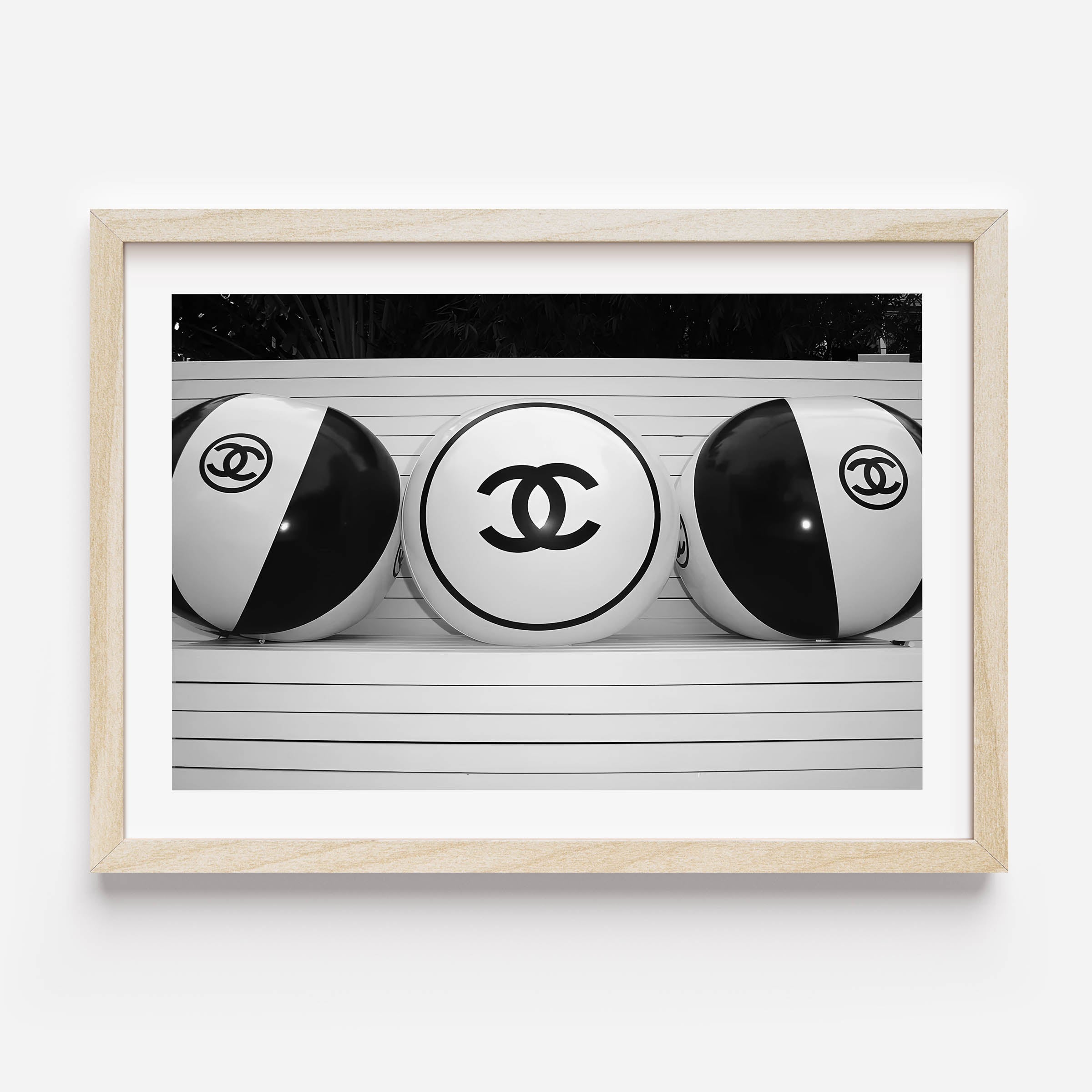 Black and white poster of chanel beach balls
