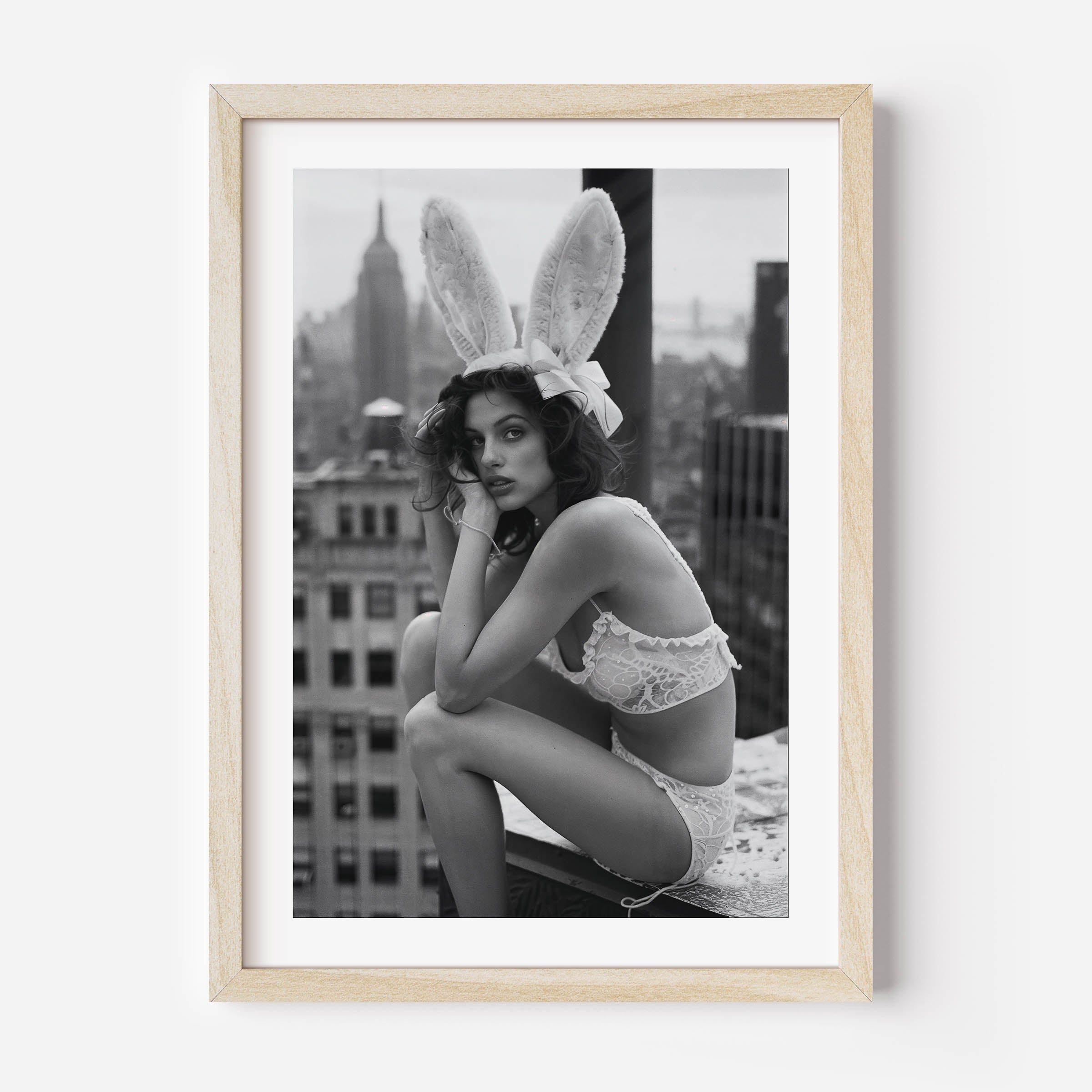 black and white poster of a playboy model on a new york rooftop, wall art, home decor