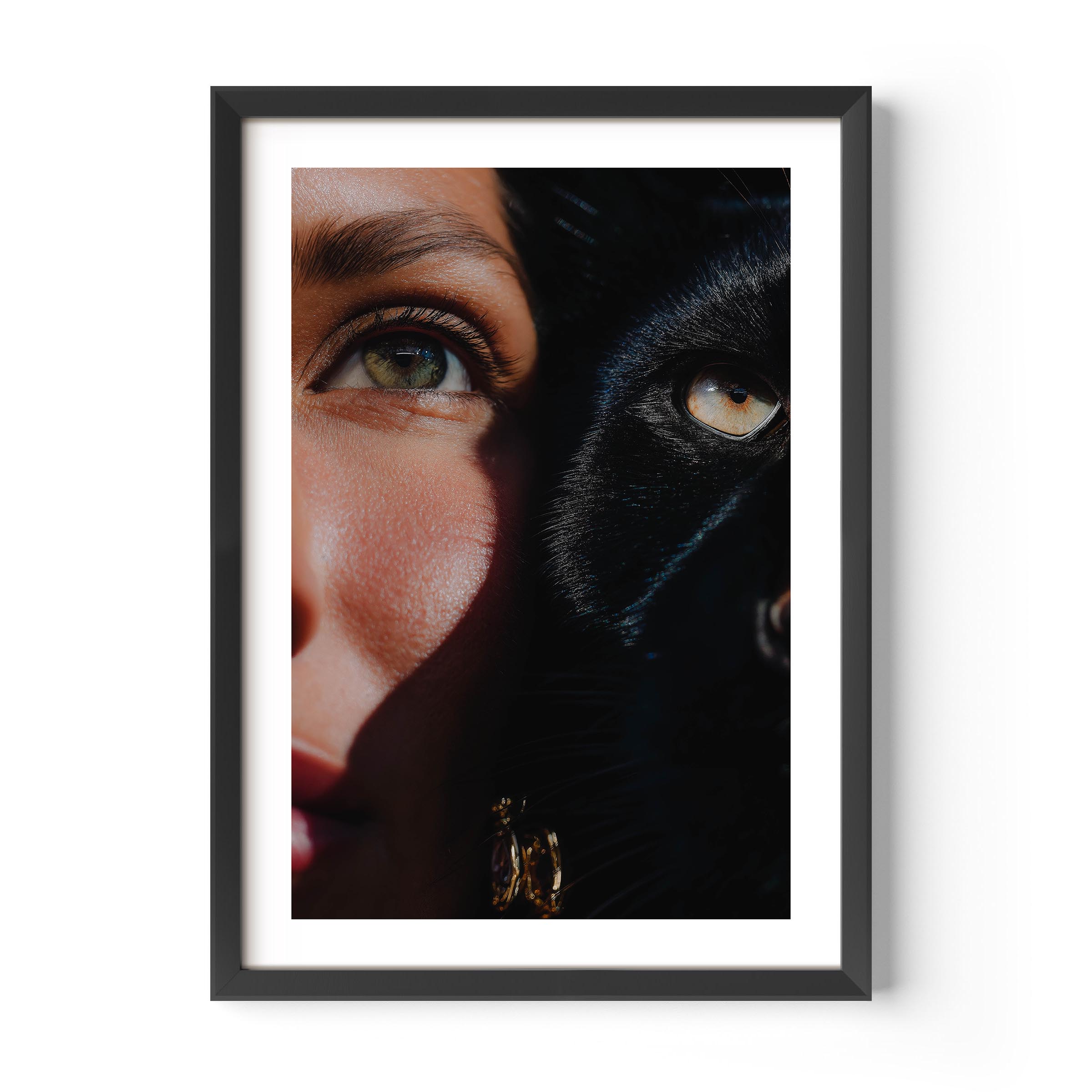 This fine art print features a powerful close-up of a woman and a black cat, their eyes aligned in perfect harmony. The rich shadows and sharp detail create a dramatic, gallery-worthy aesthetic that elevates any modern interior.