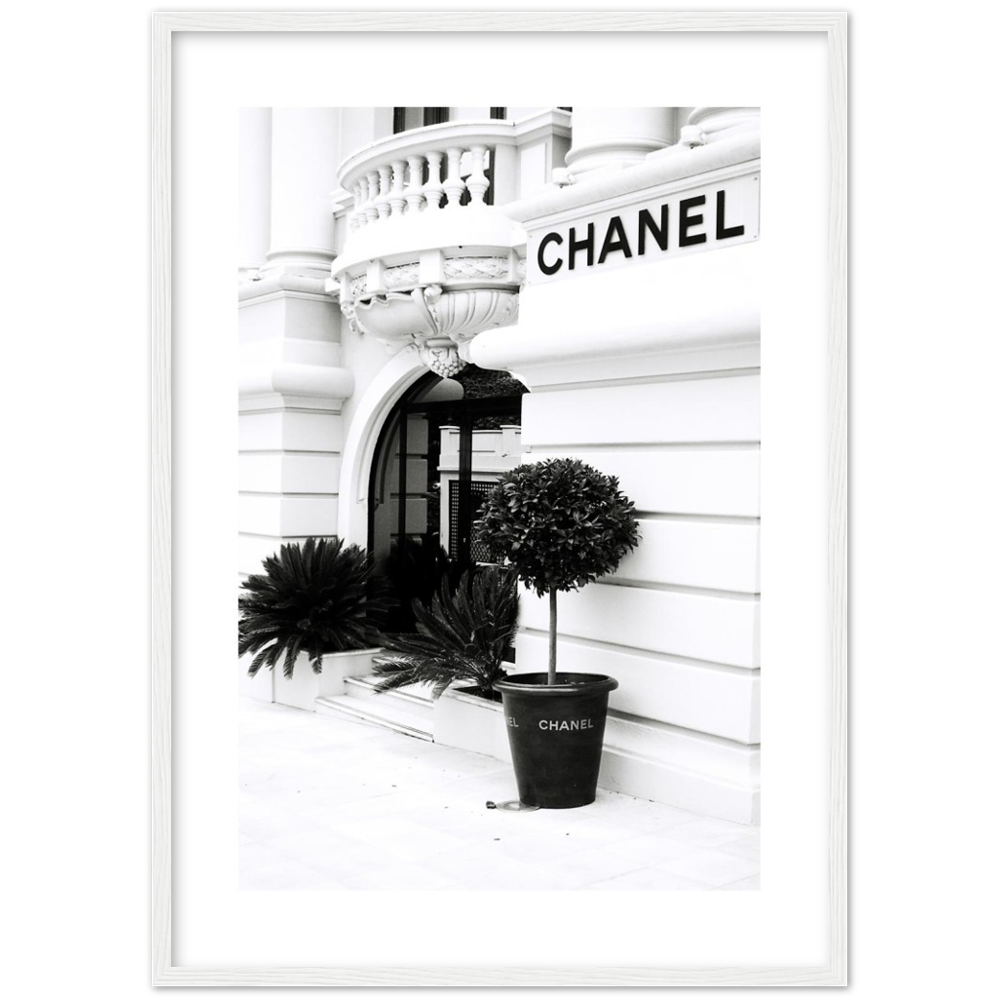 black and white print of the outside of a Chanel store