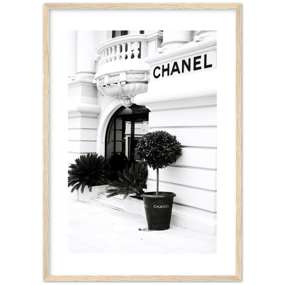 black and white print of the outside of a Chanel store